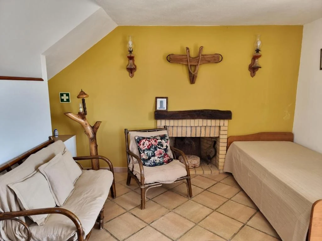 Shared fireplace interior at Casa da Mae